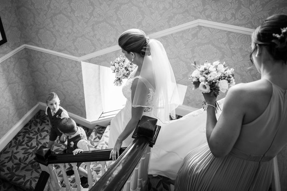 Bride walking down stairs