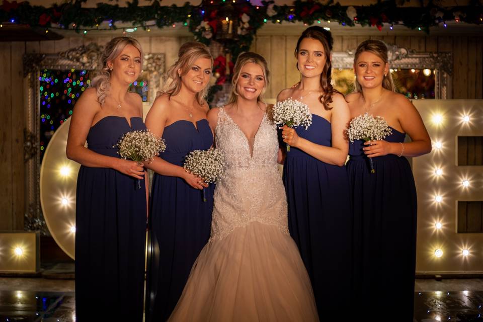 Bridesmaids and bride