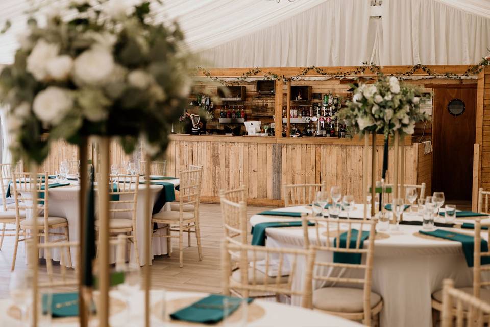 Rustic bar in luxury marquee