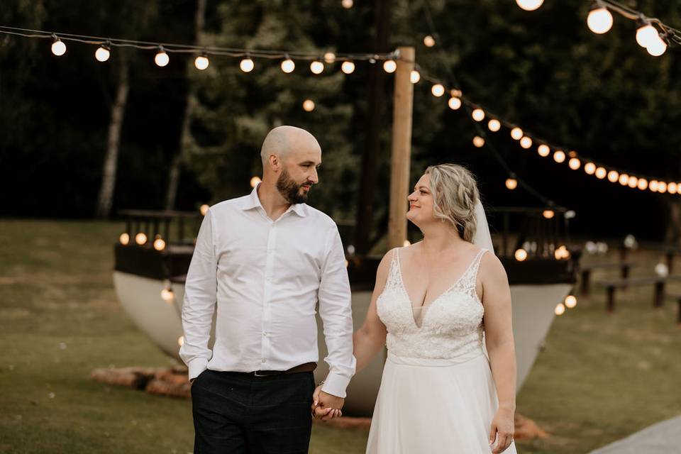 Couple with festoon lights