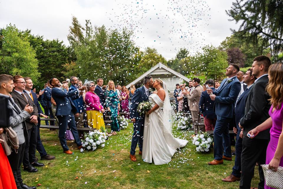 Confetti shot at top of aisle