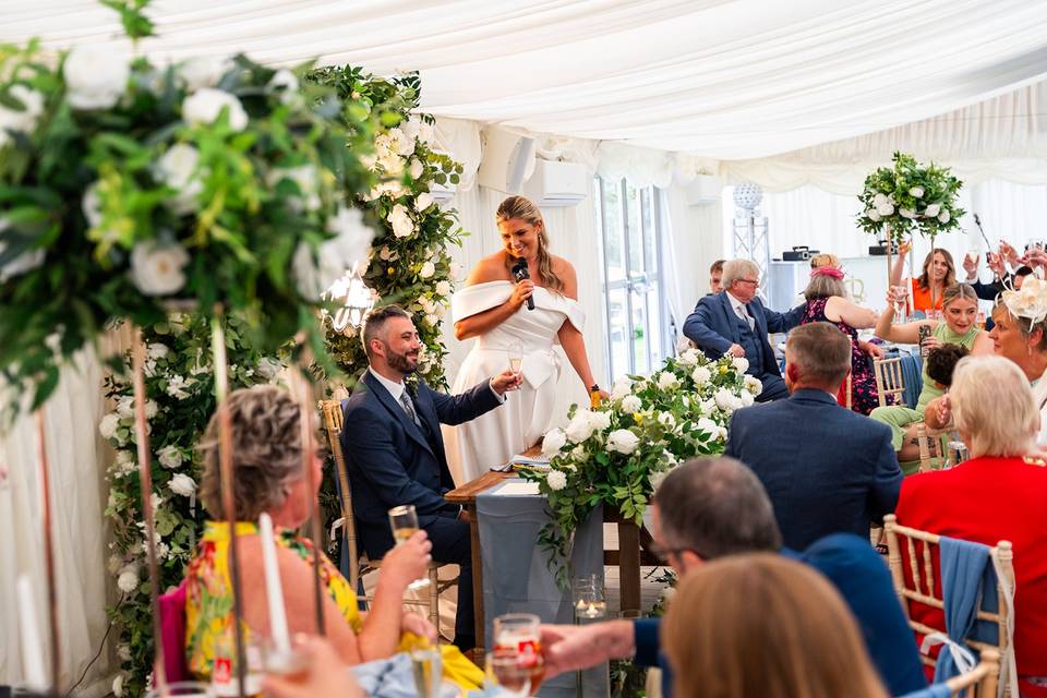 Wedding speeches in marquee