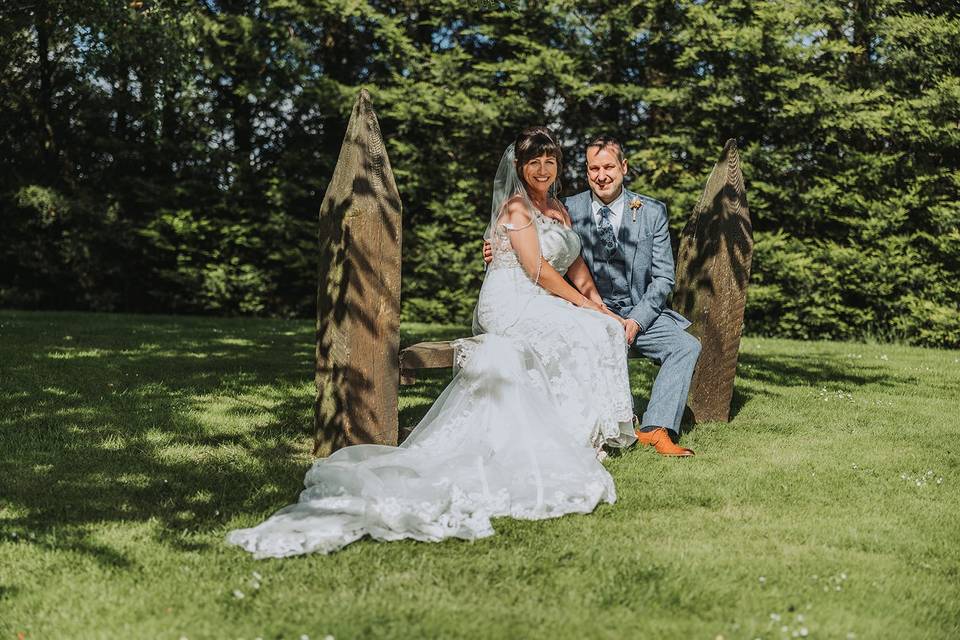 Couple on rustic bench