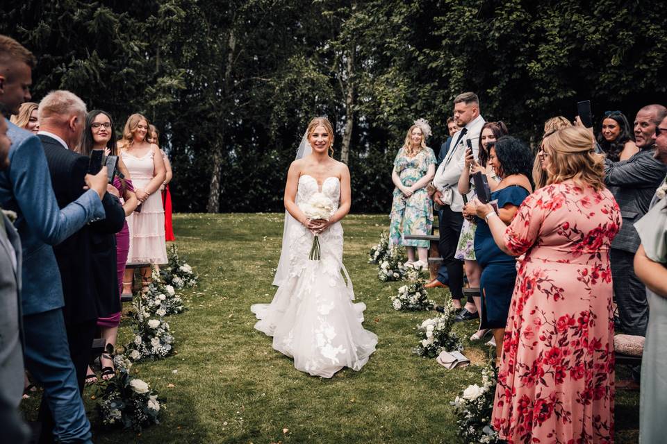 Bride walking down aisle