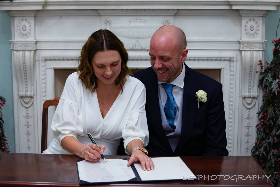 Signing the Register