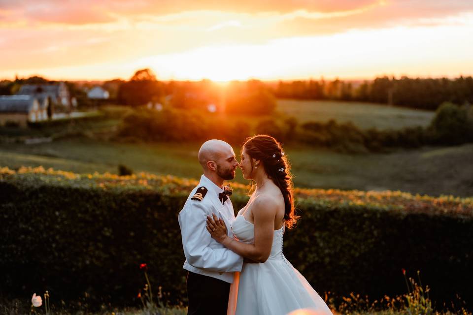 Bride and groom at sunset