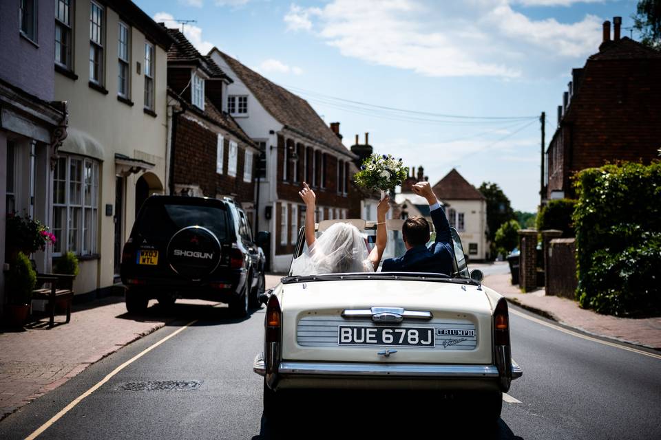 Bride and Groom drive away