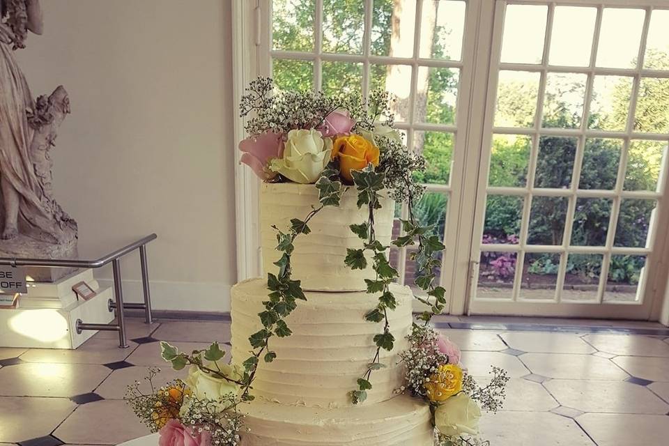 Rustic wildflower cake display