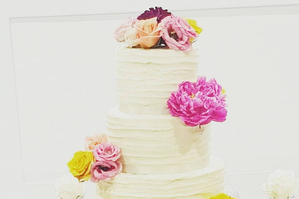 White icing with vibrant flowers