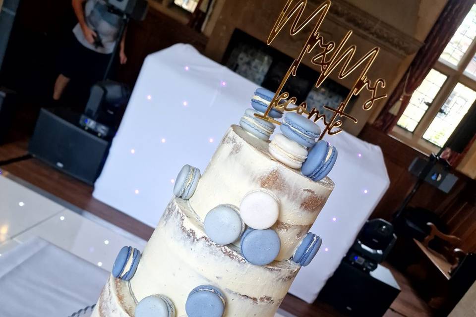 Semi naked cake with macarons