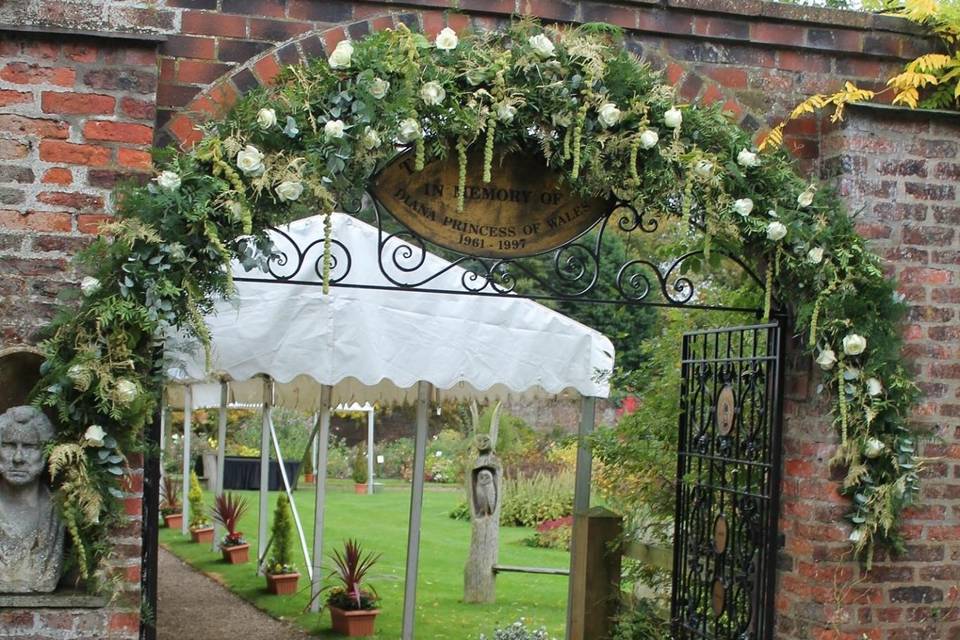 Floral arch and urns
