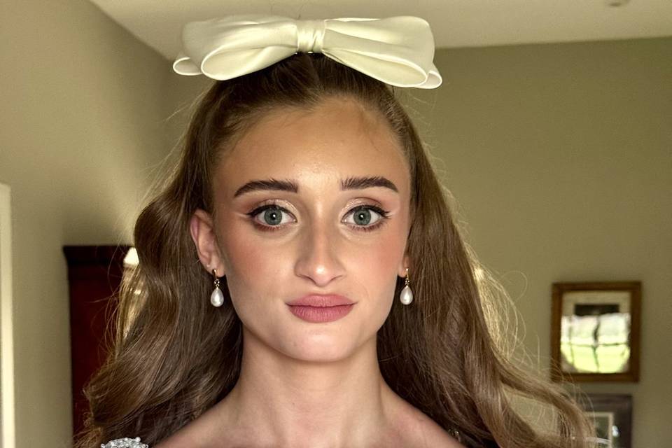 Glowy rosy bridal makeup