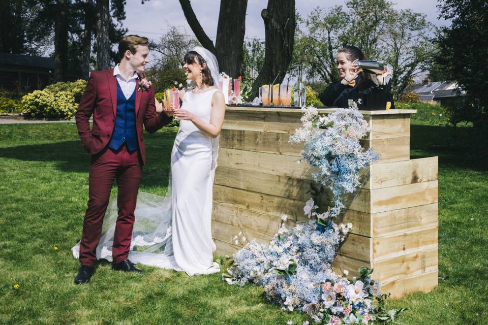 Rustic bar with bride and groom