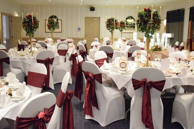 Burgundy taffeta and white chair cover