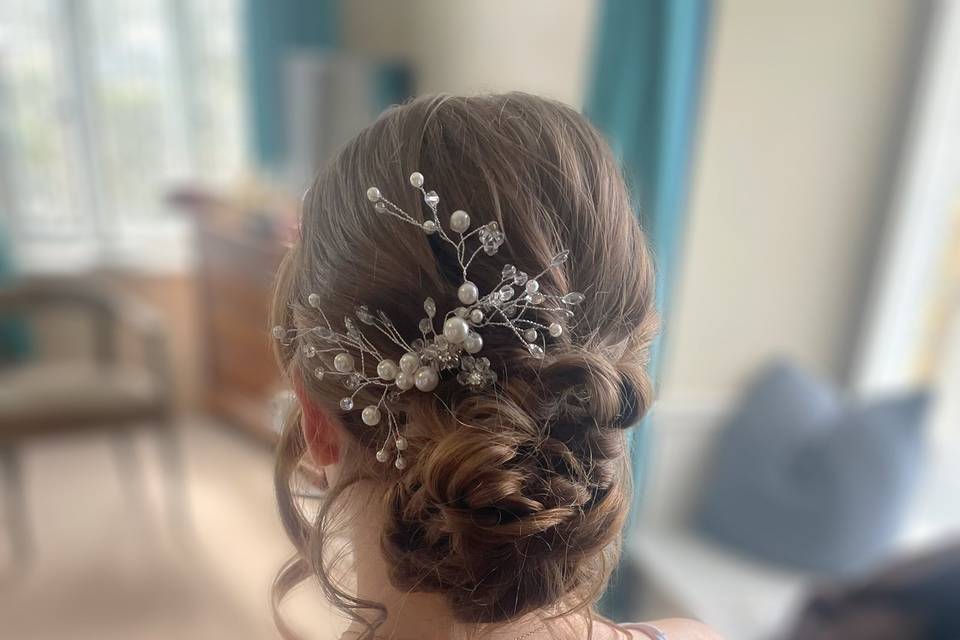 Textured low bun bridesmaid