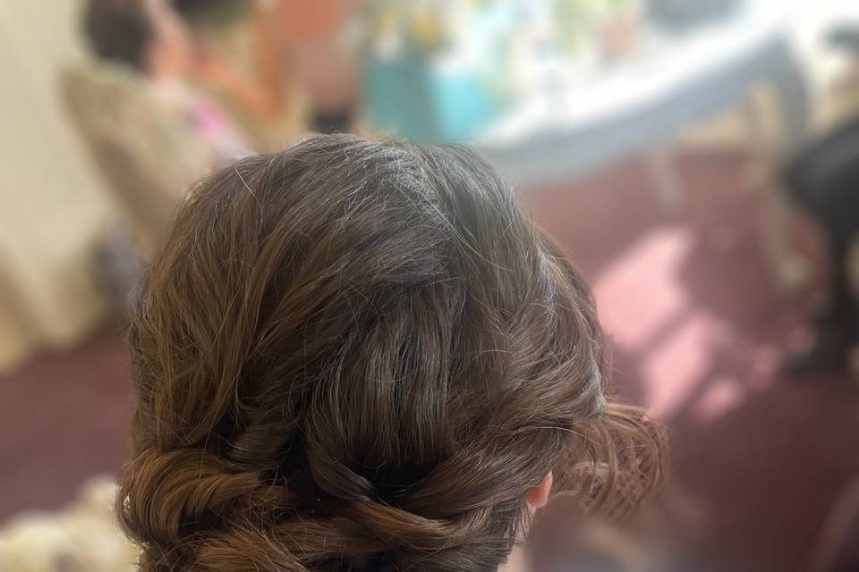 Textured, low bun . Thick hair