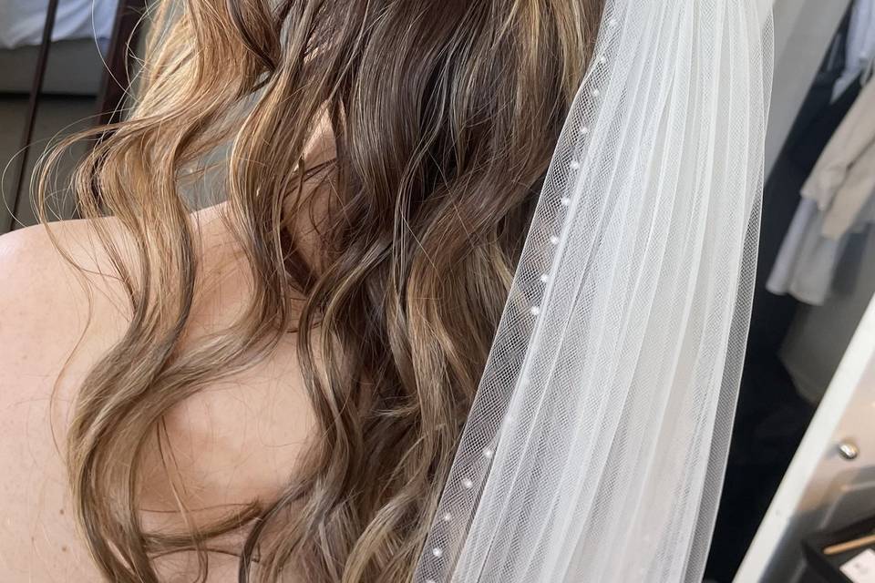 Soft twists for the bride.