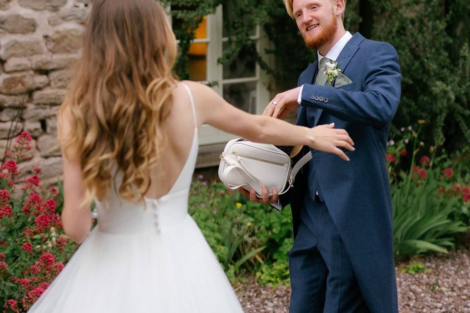 Bride and groom holding hands