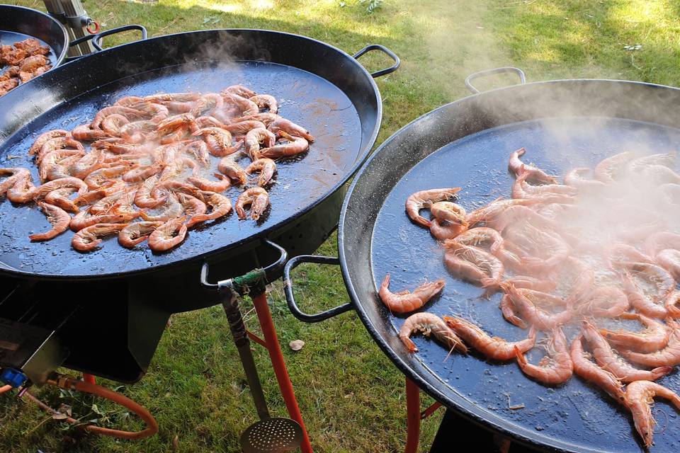 The prawns sizzling away