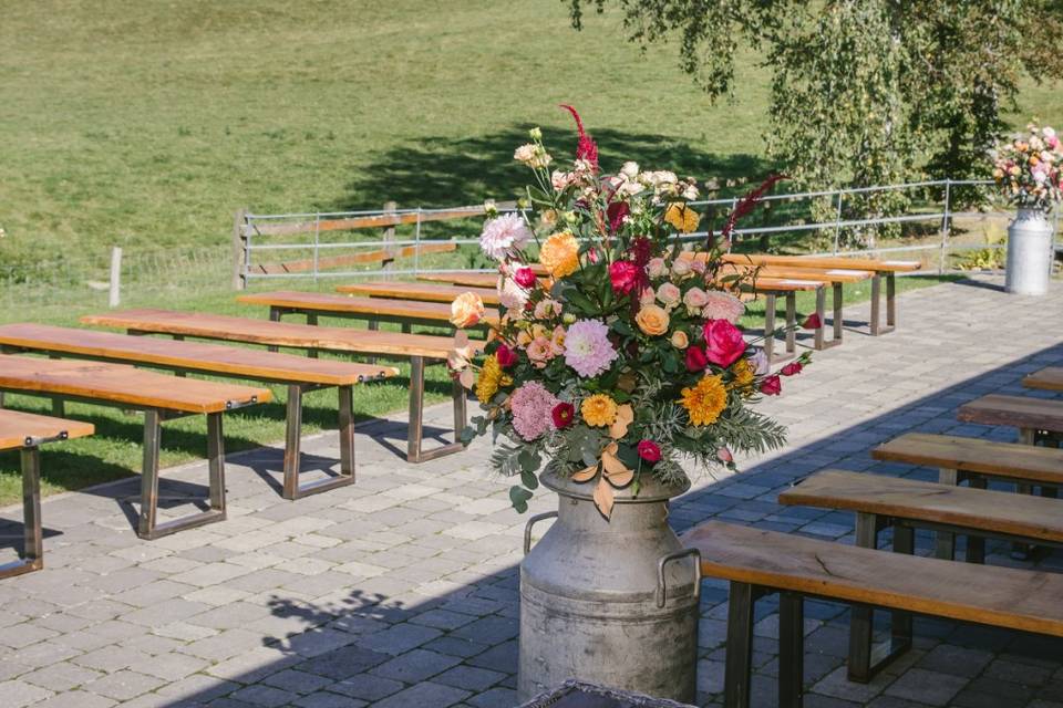 Outdoor setting with milk chur