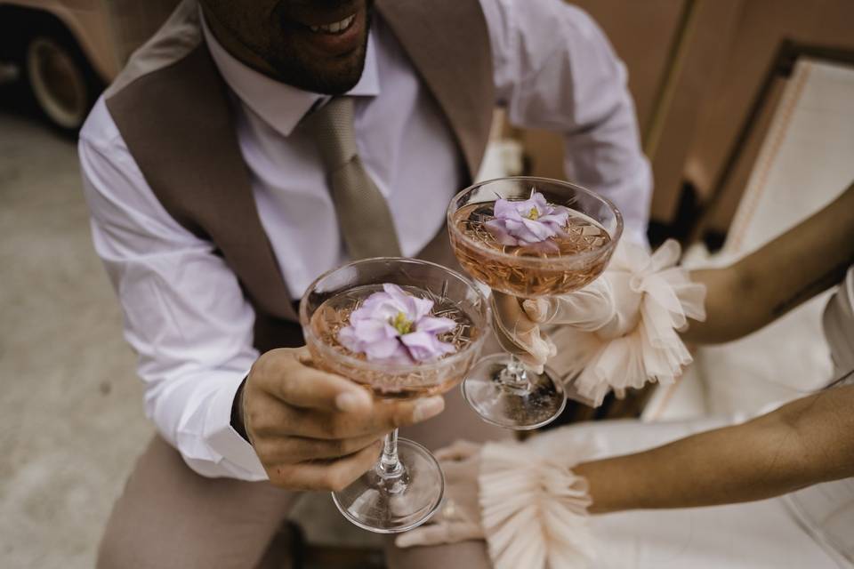 Cheers with lilac flowers