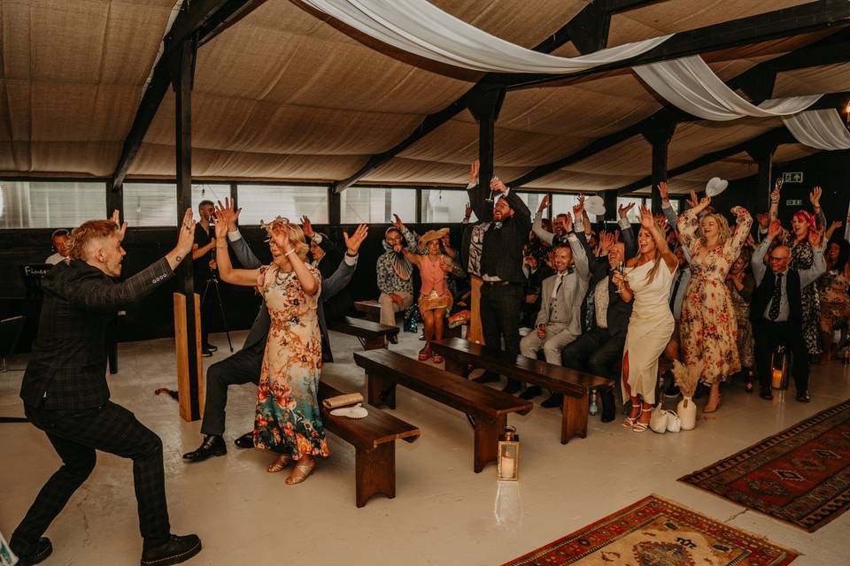 Groom entertaining guests