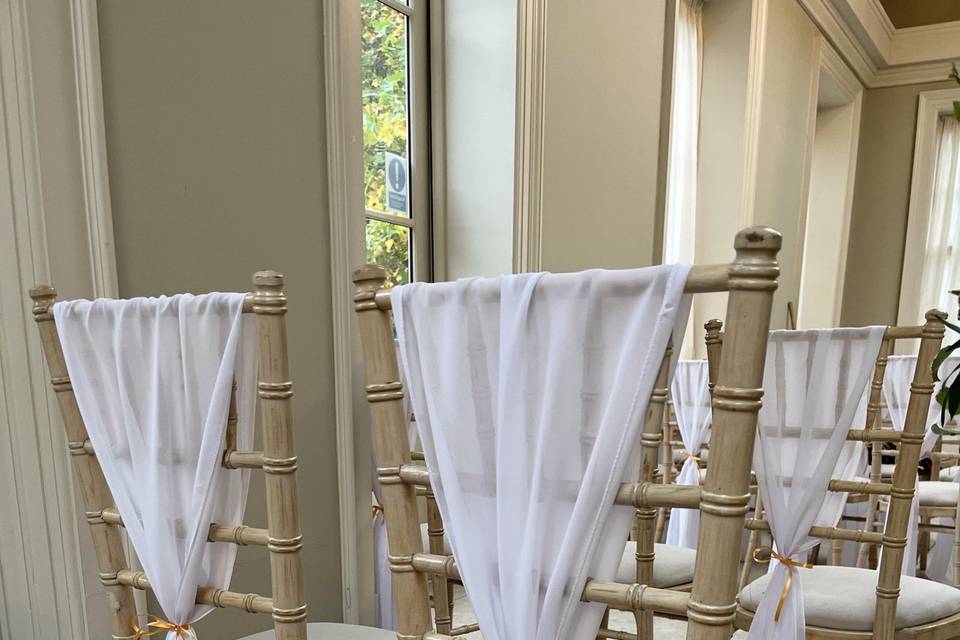 White chair drapes