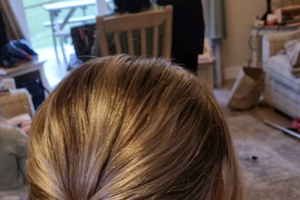 Long hair , different low Bun