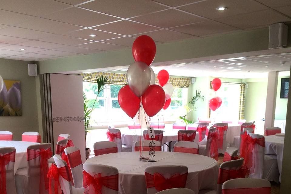 Red and white, with balloons