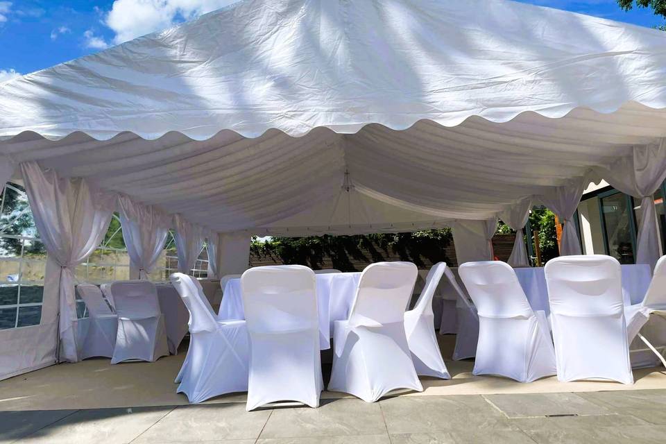 Outdoor marquee seating setup