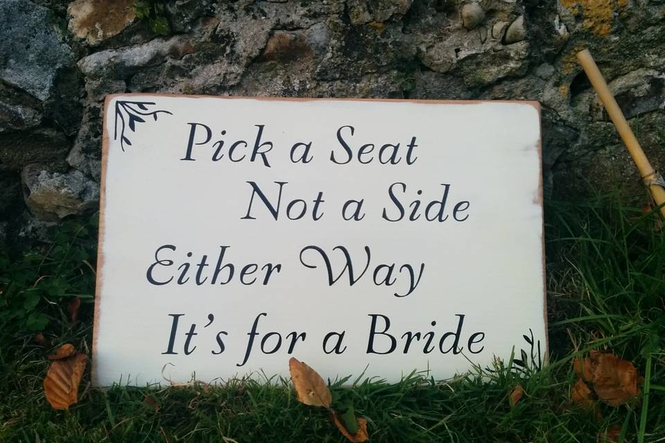 Pick a seat wedding sign