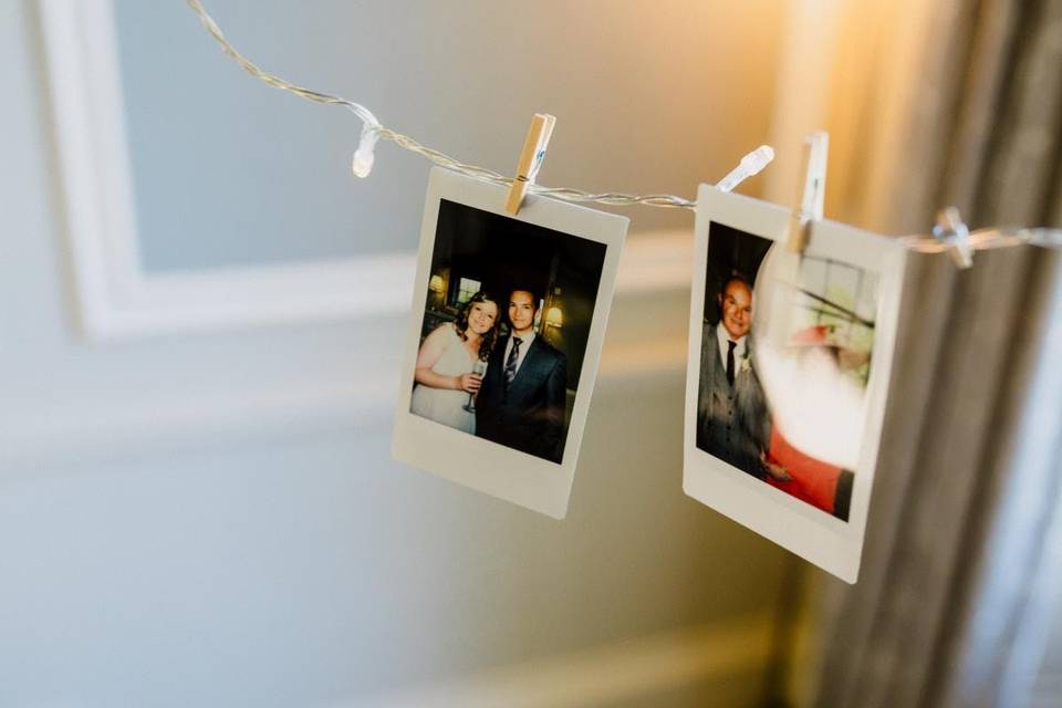 Photos hanging at a wedding