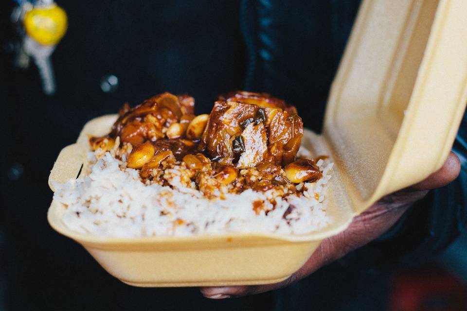 Dumplings plantain, jerk chicken, curried goat and rice and peas