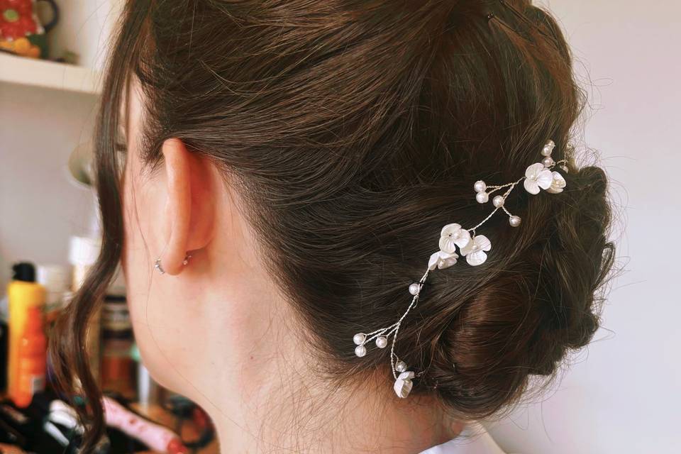 A classic low bun with detail