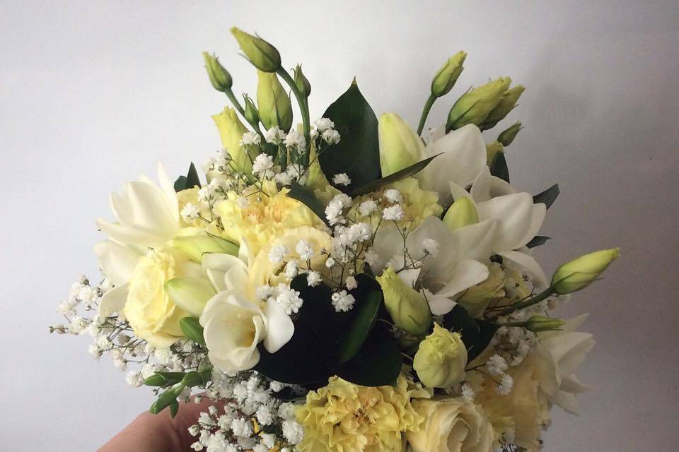 Bridal Bouquet with Yellow Roses, White Freesia, Lisianthus, Gypsophila and Ruscus
