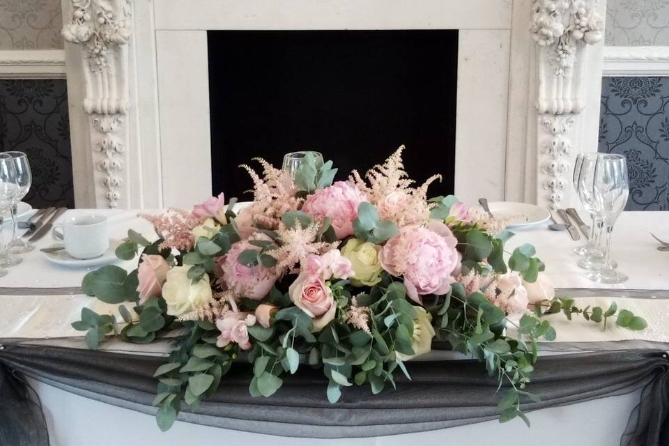 Long and Low Floral Displays in Pink