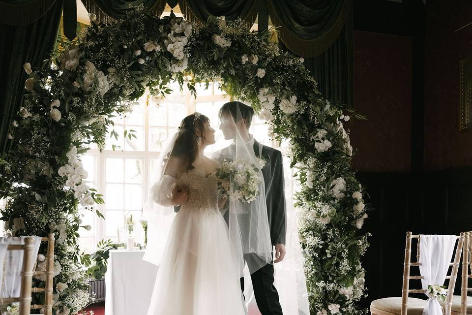 Ceremony foliage floral arch