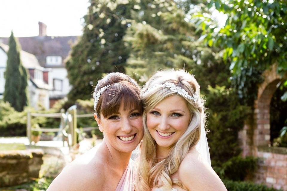 Bride and bridesmaid