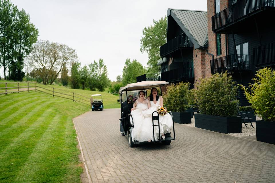 Two brides in the caddy