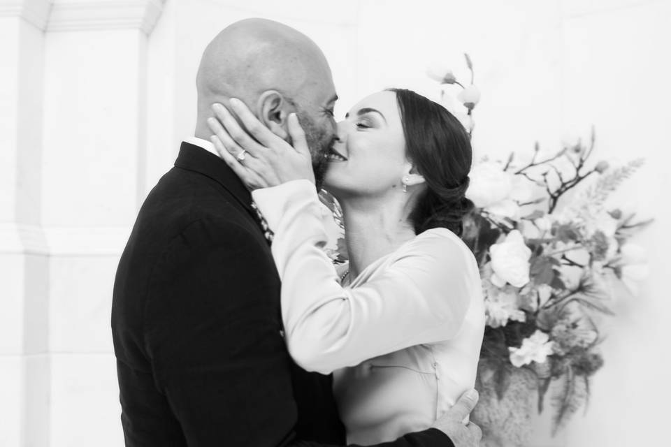 Bride and groom share a kiss