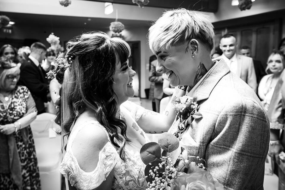 Brides embrace