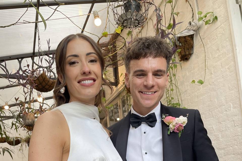 Bride and groom with pic