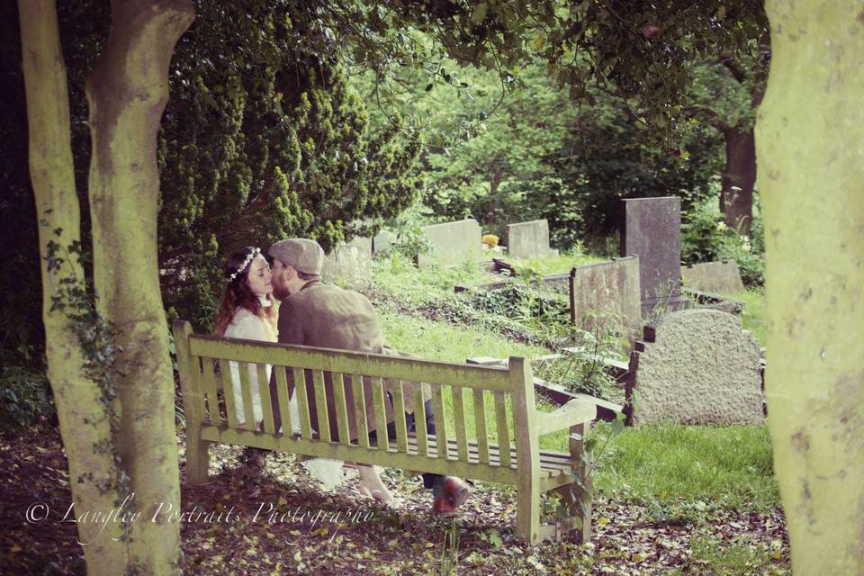 Vintage wedding bench kiss