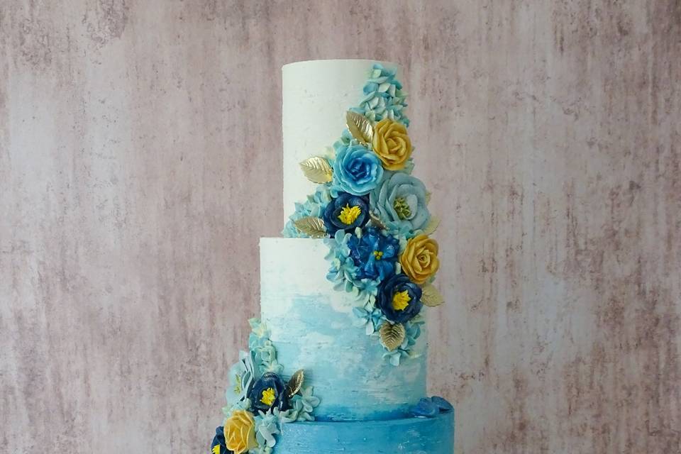 Blue ombre floral cake