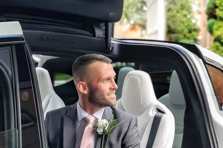 Guest-of-honor seated in car