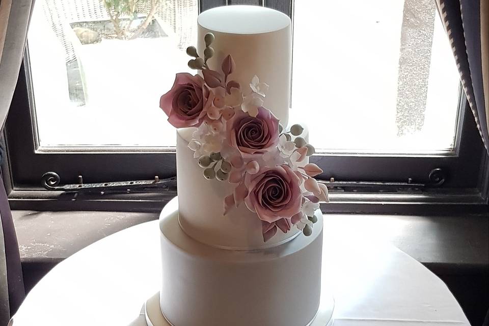 White cake with pink florals