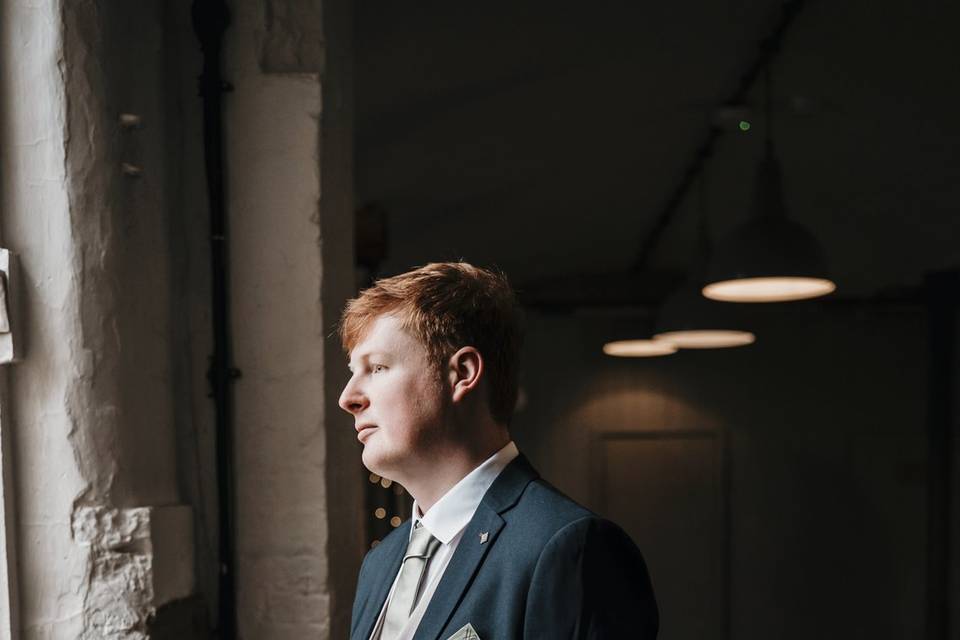 Groom by the window