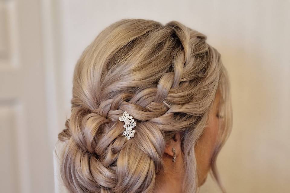 Low bun with plait