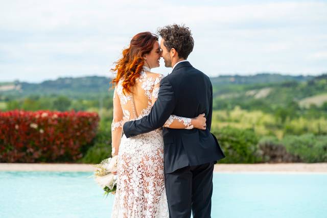 Infinity pool with newlyweds