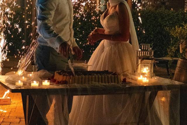 Wedding cake cutting at pool